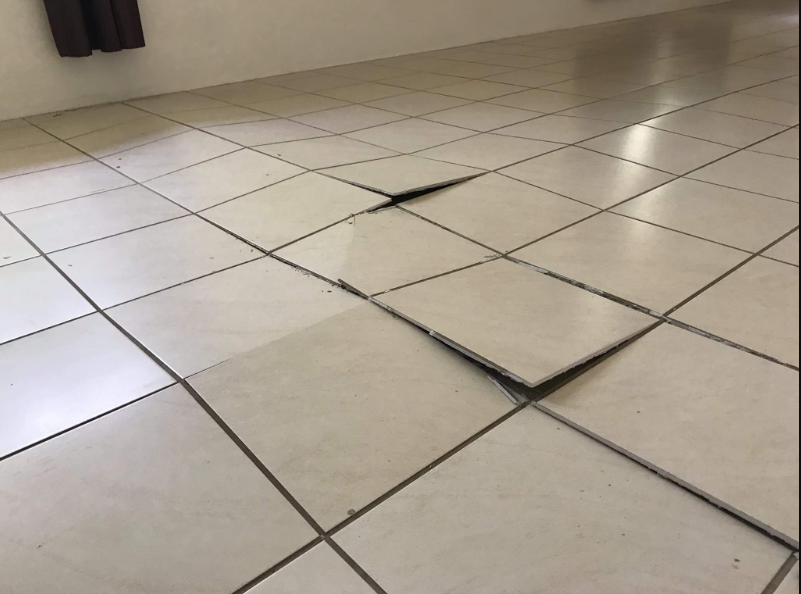 loose floor tiles repair